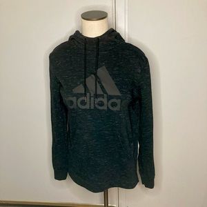 Black on black Adidas sweatshirt.